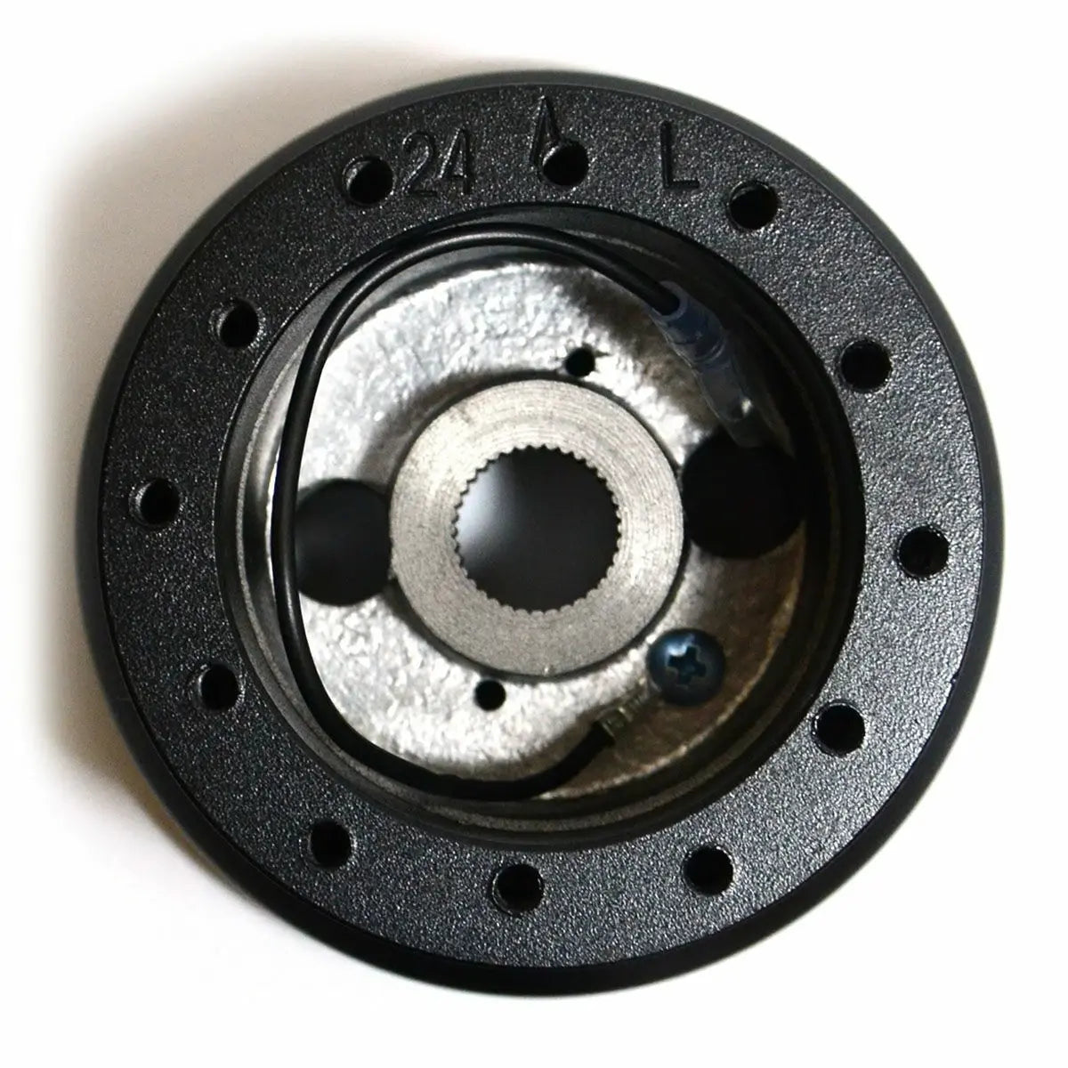 Mechanical component with a central gear and flange on a white background