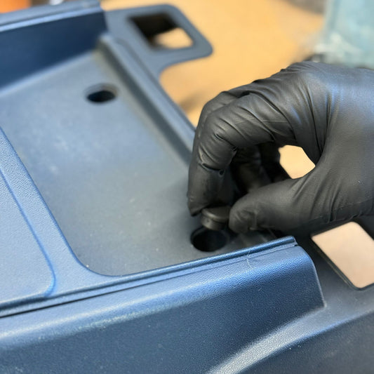 Picture of screw cover being installed