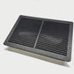 Rectangular black air filter on a white background