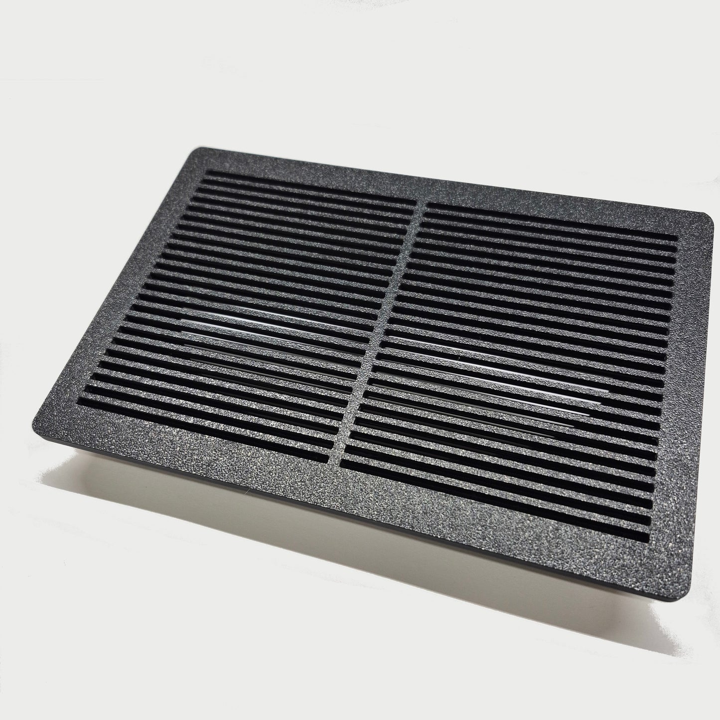 Rectangular black air filter on a white background