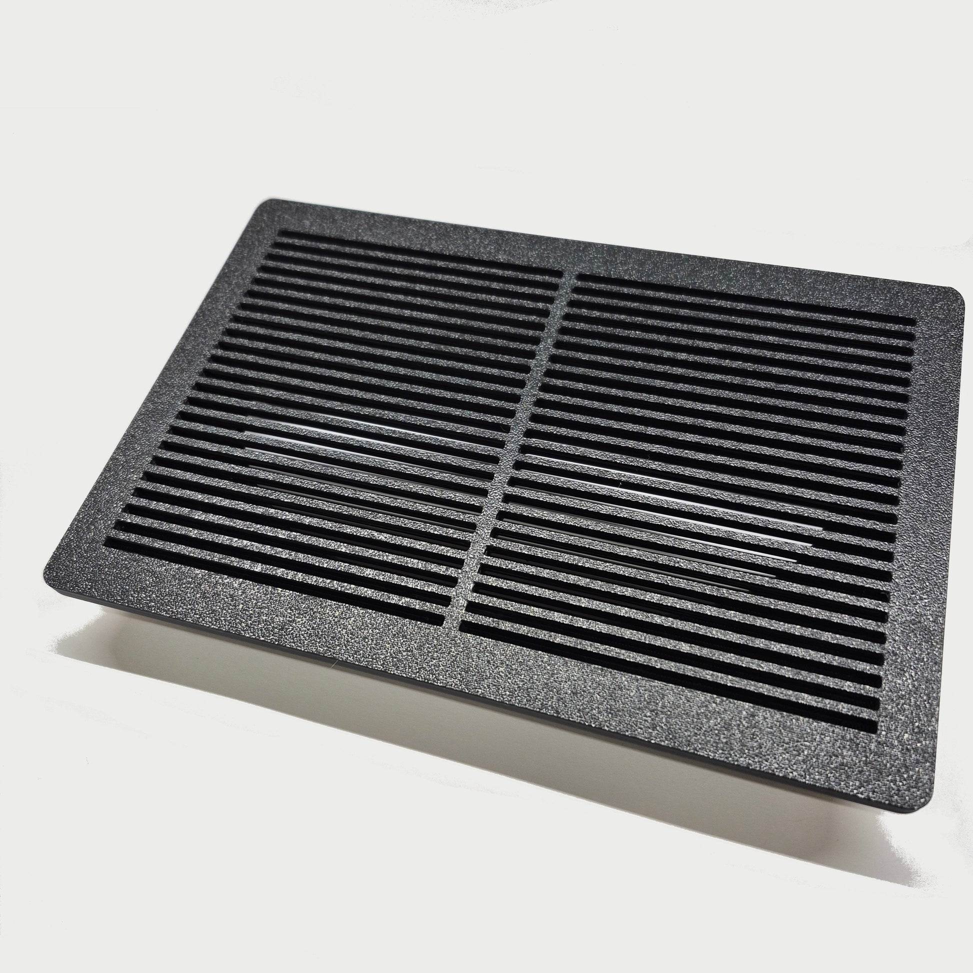 Rectangular black air filter on a white background