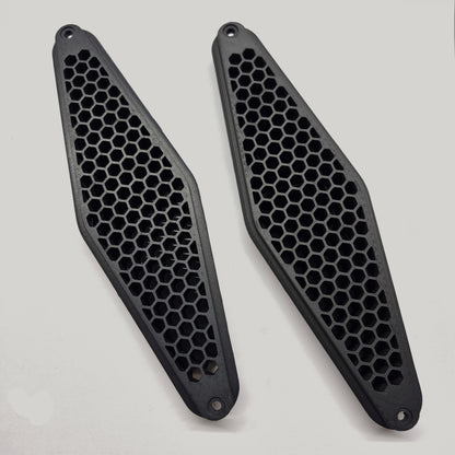 Two black honeycomb-patterned on a white background