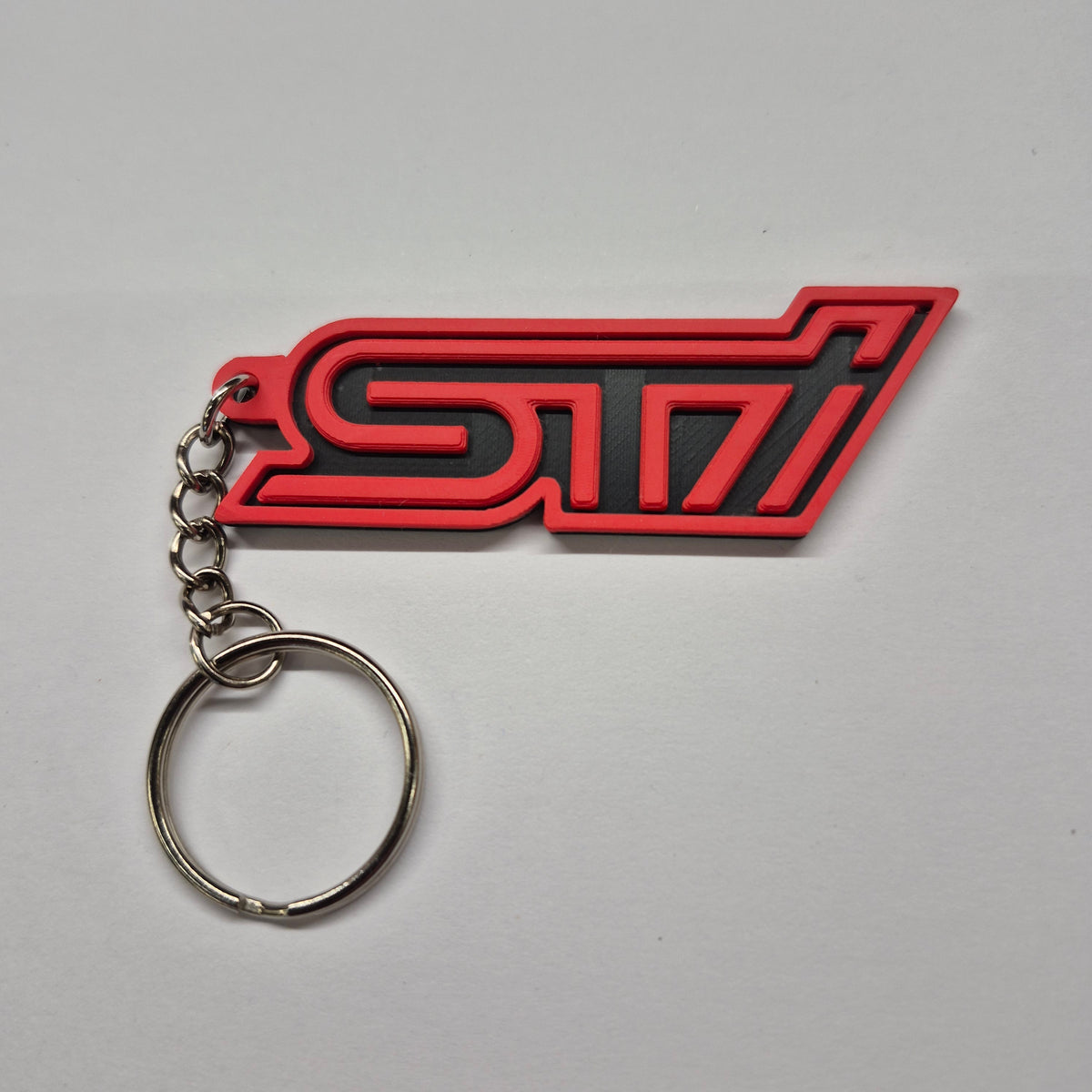 Red and black Subaru STi WRX badge keyring – JDM keychain made in Australia