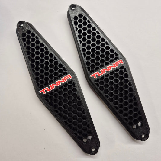 HQ–WB Holden One Tonner Tunna GTS style side vents, black honeycomb with red and white TUNNA badge – pair shown at an angle