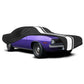 Car cover over a purple muscle car on a white background