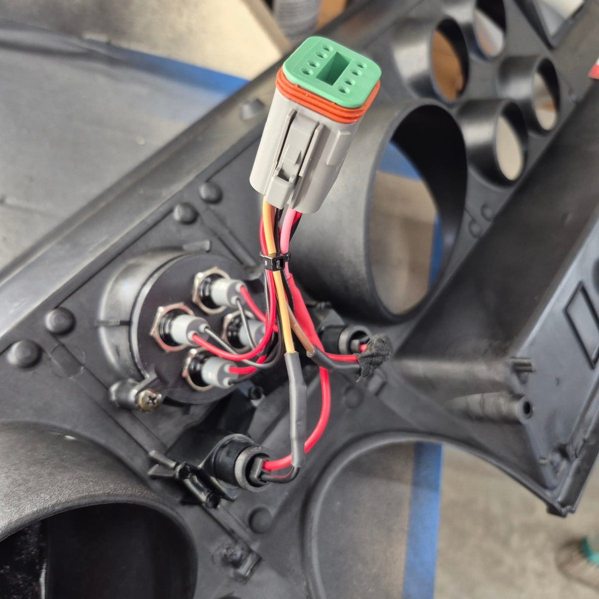 Pilot light cluster fitted to the back of an HJ-WB Holden GTS dash fascia with Deutsch connector and warning light sockets