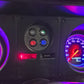 HJ-WB Holden GTS pilot light cluster installed in the clock position, showing turn signal, hand brake and high beam lights with brake and battery warning lights