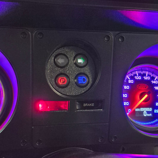 HJ-WB Holden GTS pilot light cluster installed in the clock position, showing turn signal, hand brake and high beam lights with brake and battery warning lights