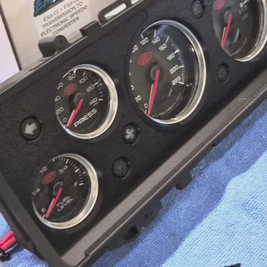 VB–VH Commodore RetroTech 603 dash kit with SAAS Series 3 gauges doing a needle sweep on the bench