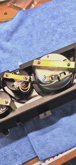 Rear of the VK Commodore RetroTech 62D dash kit showing the gauge brackets and pre-wired loom
