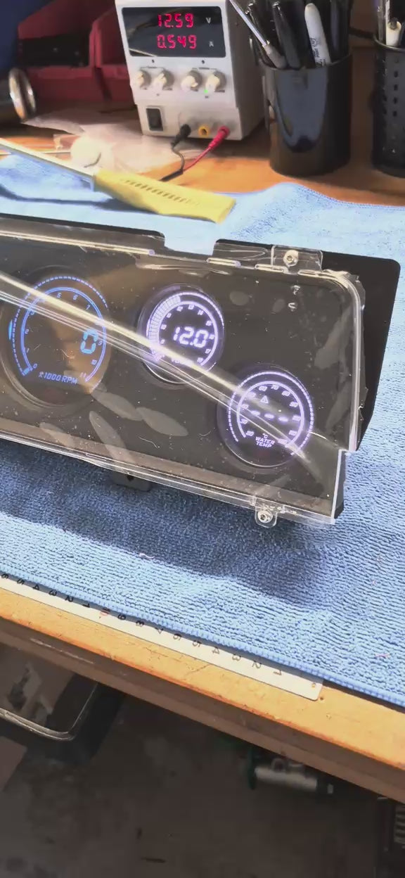 VK Commodore RetroTech 62D dash kit with SAAS Muscle Digital gauges lit up on the bench